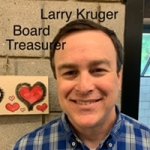 Larry Kruger Board Treasurer, Caucasian man with brown hair; wearing a blue plaid button down shirt